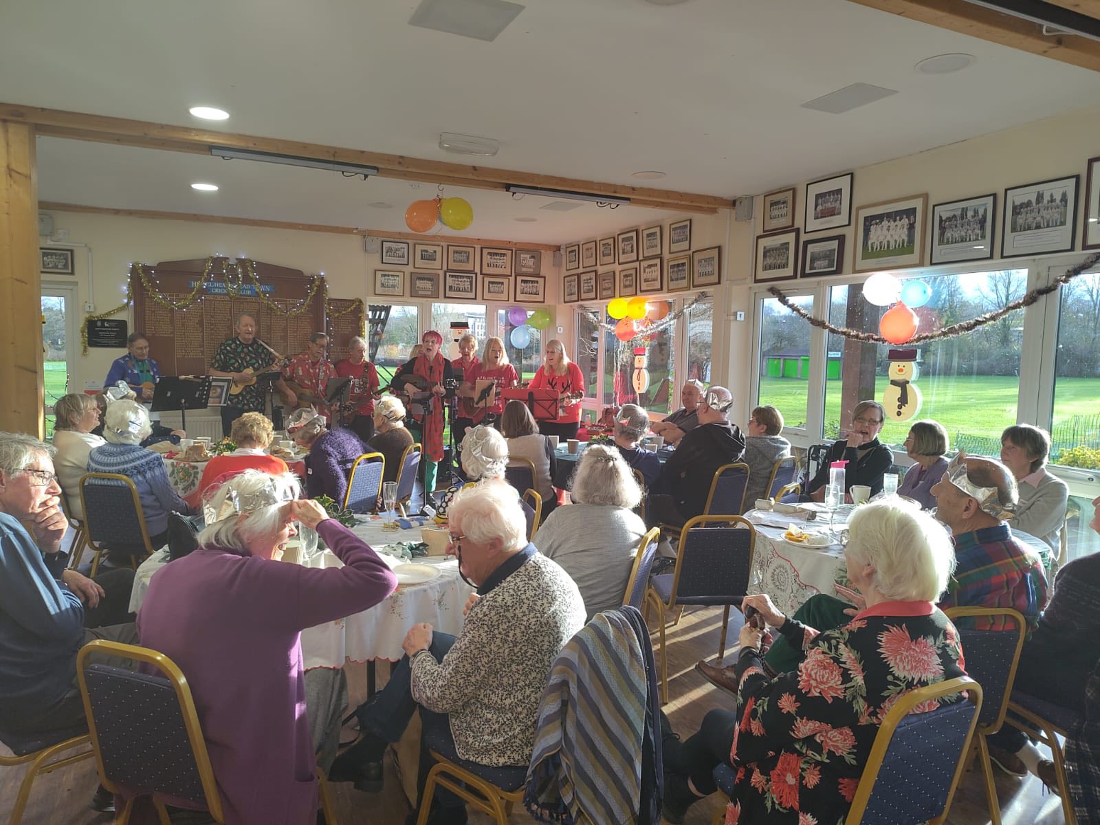 Our neighbours enjoying the performance by the U3A ukulele band